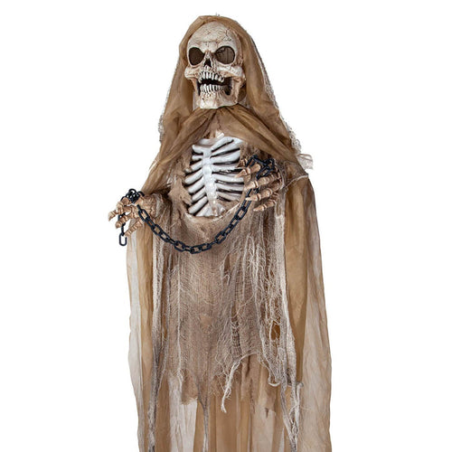 Close up of a hanging Skeleton with hands in chains for Halloween
