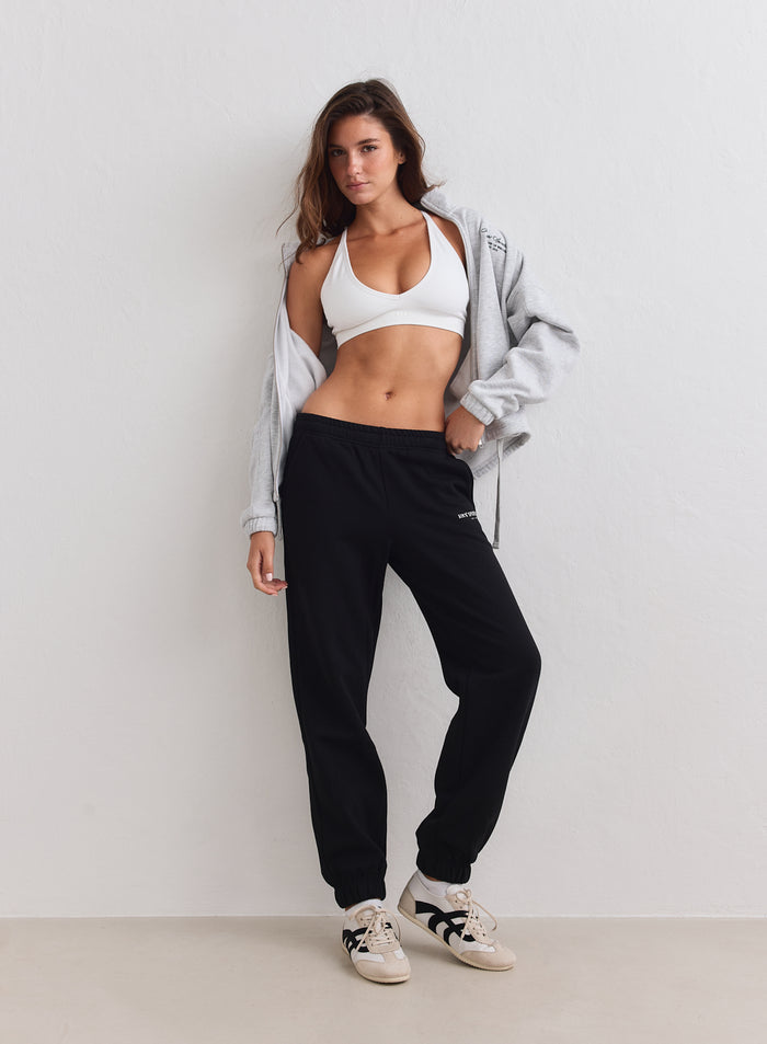 Mustat aim'n Classic Sweatpants -collegehousut pehmeää harjattua jerseytä rennolla istuvuudella. [S-163cm]