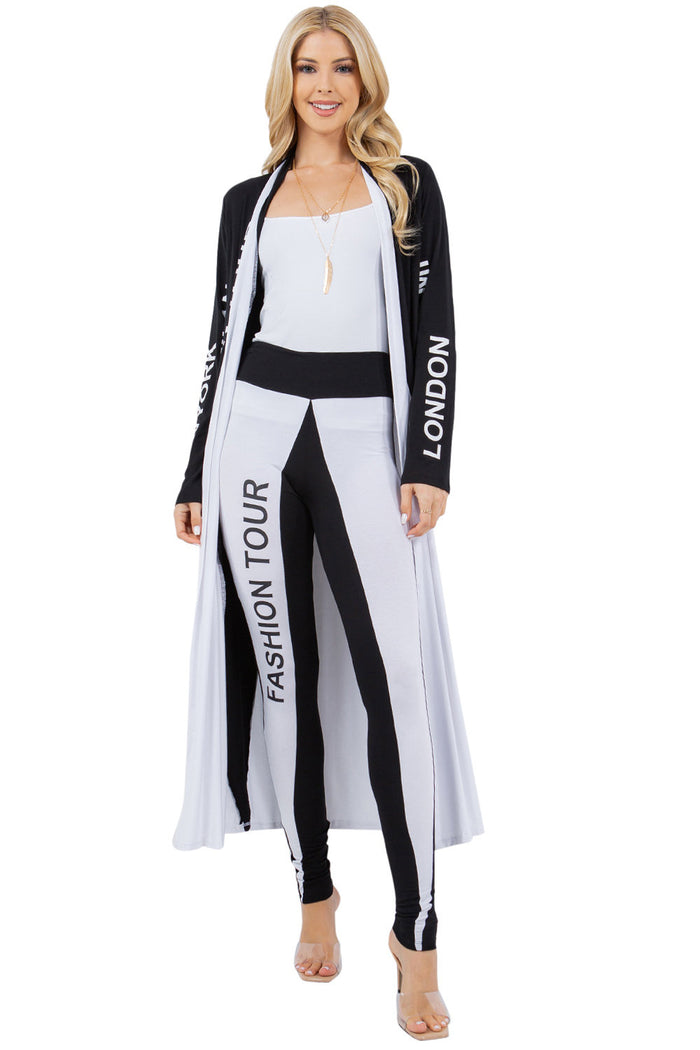 Black and white Fashion Tour leggings with bold vertical color blocking, a high waistband, and graphic side detail.