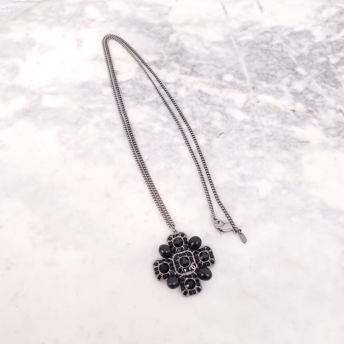 CHANEL BLACK CRYSTAL CROSS WITH LOGO
