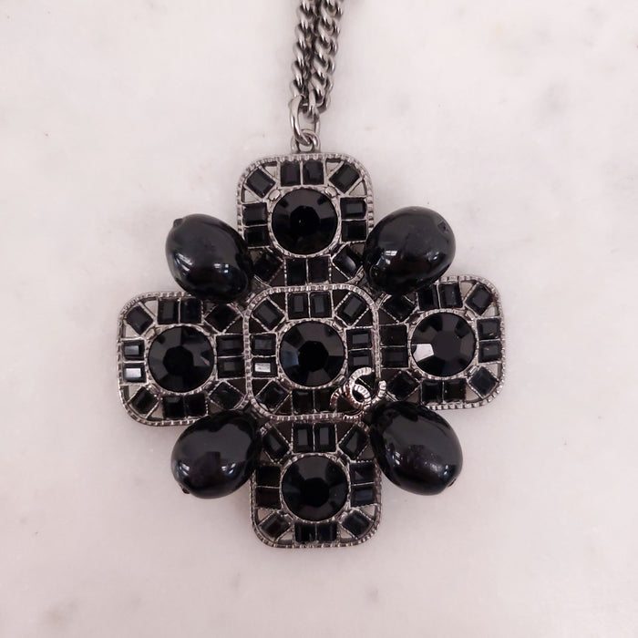 CHANEL BLACK CRYSTAL CROSS WITH LOGO