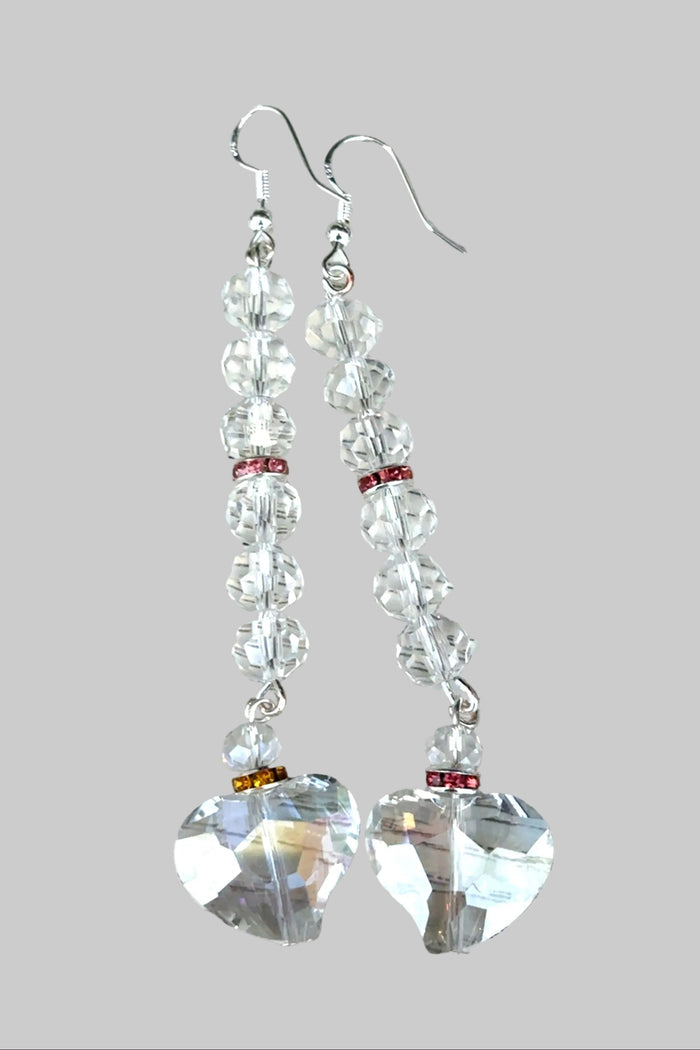 Style the Clear Heart Long Drop Earrings exclusively at Born To Glam