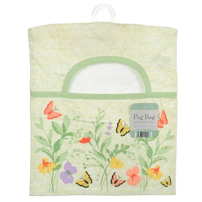 Peg bag with floral and butterfly design on beige cotton with green trim