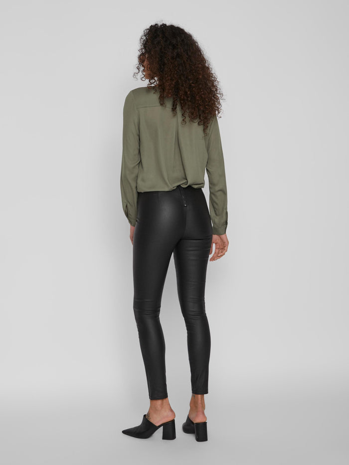 Back of the COMMIT COATED PANTS (BLACK)