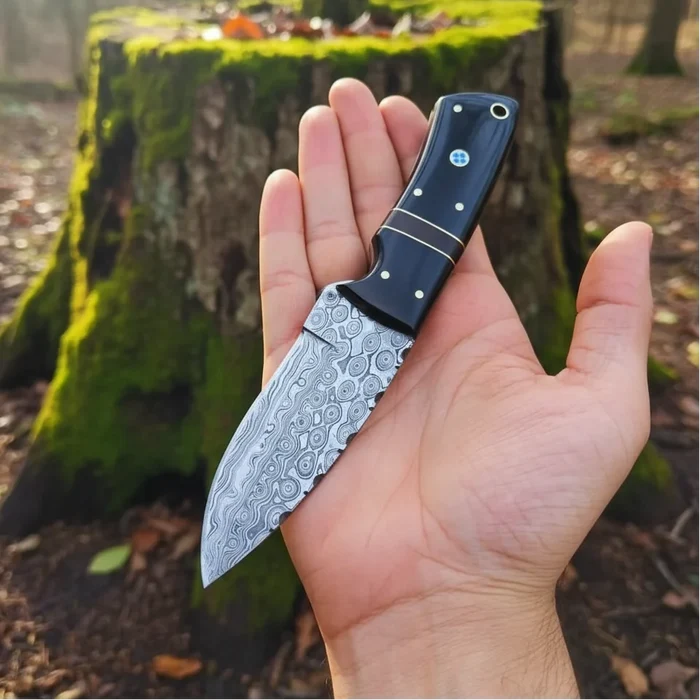 Compact Damascus Hunting Knife - Precision and Craftsmanship in Your Hands - RFE Marketing Ventures
