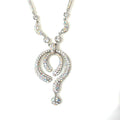 Long necklace with iridescent Crystal AB beads, an elongated chain, and a light-catching drop accent for statement glam.