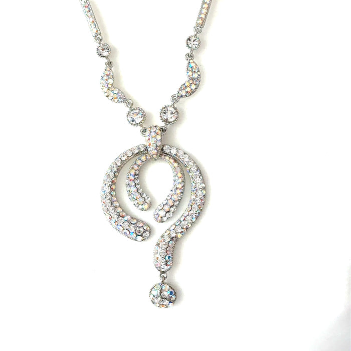 Long necklace with iridescent Crystal AB beads, an elongated chain, and a light-catching drop accent for statement glam.