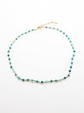 The Faye Necklace in Teal featuring apatite beads and stainless steel accents on a white background.
