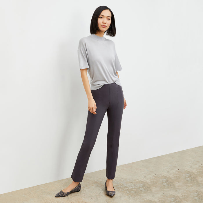 Front image of a woman standing wearing the foster pant in monsoon | Lead