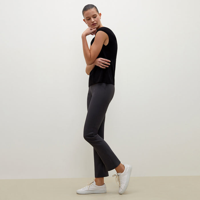 Side image of a woman standing wearing the foster pant in monsoon