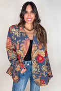 Imperial Indigo Brocade Blazer, a structured navy women’s jacket with ornate gold and red floral brocade detailing.