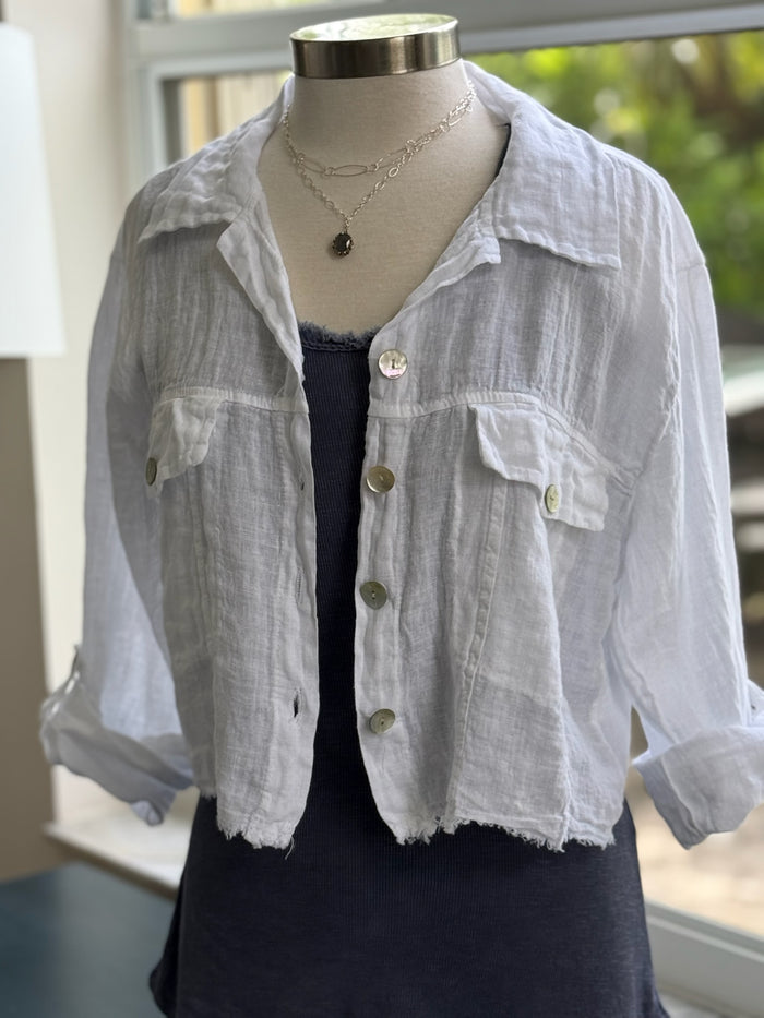 Julia Linen Jacket in white layered over a basic navy tank and styled with Nina Halls jewelry