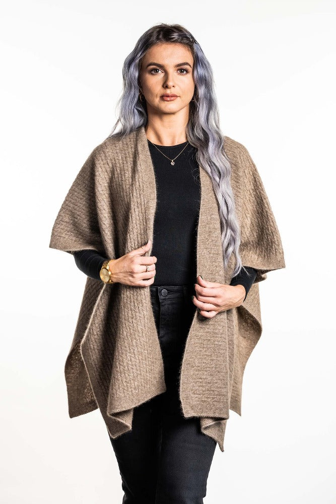 Possum and Merino  KO553 Zig Zag Textured Cape - A great throw on and go piece in a detailed zig zag pattern.  Available only in size Small or Large  Made proudly in New Zealand from a premium blend of 40% possum fur, 50% merino lambswool & 10% mulberry silk.