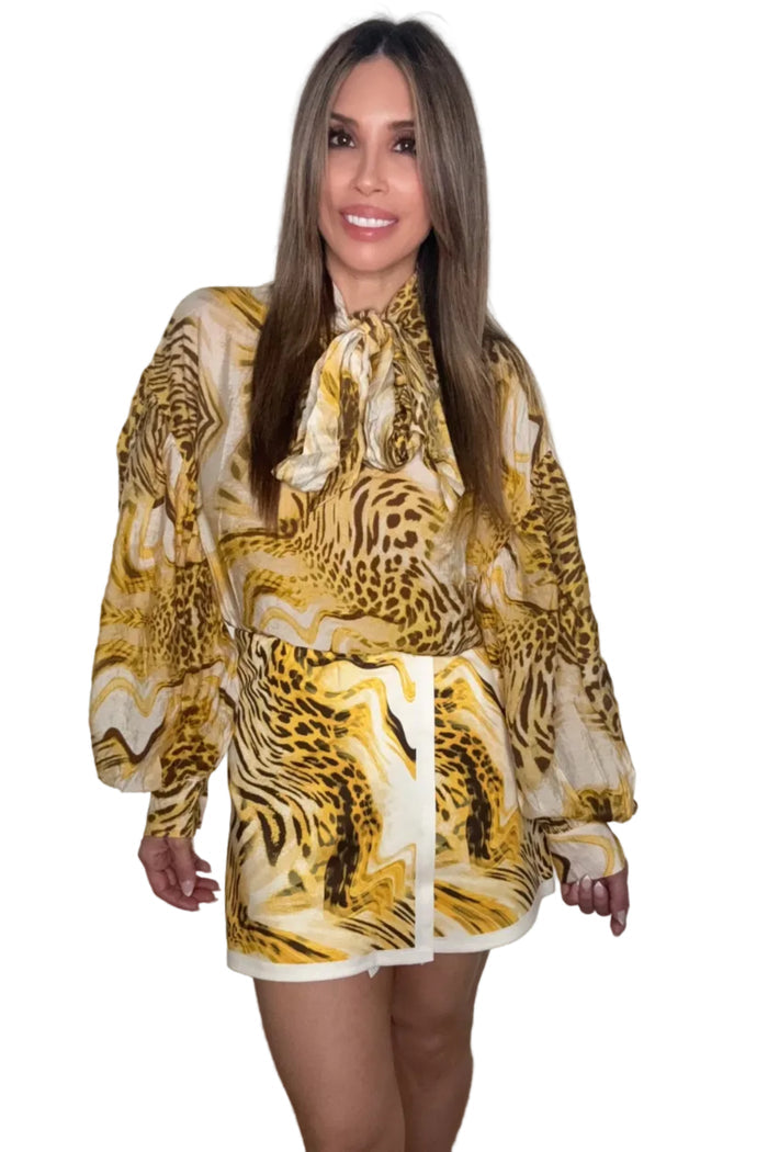 Style the Leopard Print Balloon Sleeves Tie Neck Blouse exclusively at Born To Glam