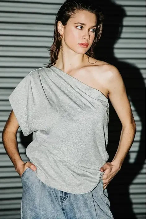 Gray one-shoulder women's top with an asymmetrical neckline and relaxed hip-length drape.