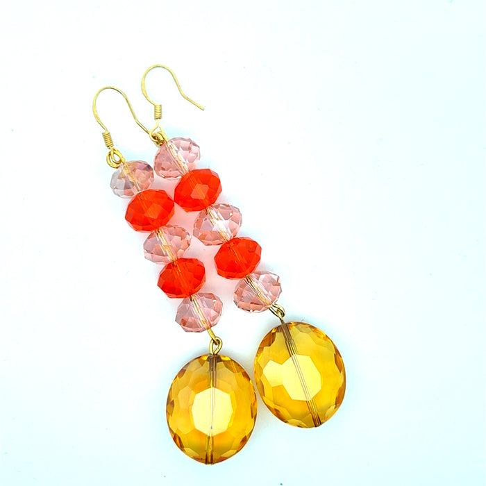 Style the Peachy Amber Crystal Earrings exclusively at Born To Glam