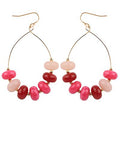 Pink beaded teardrop earrings with mixed bead tones