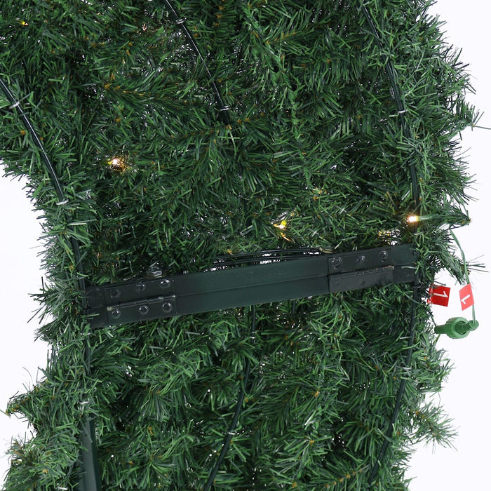 back view of moon shaped tree with metal stand and light connectors