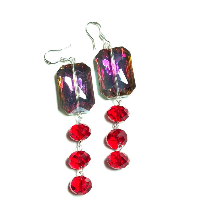 Red rectangle tiered crystal drop earrings with faceted stones and a modern geometric silhouette.