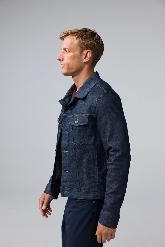 Side view of man wearing SILVER Denim Jacket in Dark Indigo