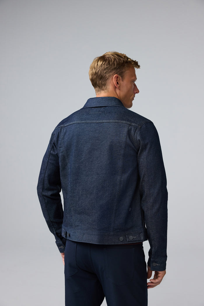 Back view of man wearing SILVER Denim Jacket in Dark Indigo