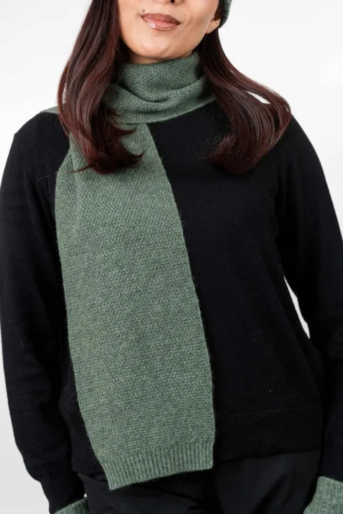 Possum and Merino  TR100 Moss Stitch Scarf - A plain scarf using moss stitch.  Makes a set with TR49 Plain Gloves and TR200 Moss Stitch Beanie.   One Size Only – Approx. 19cm wide x 157cm long   Made proudly in New Zealand from a luxurious blend of 25% possum fur, 65% merino & 10% silk.