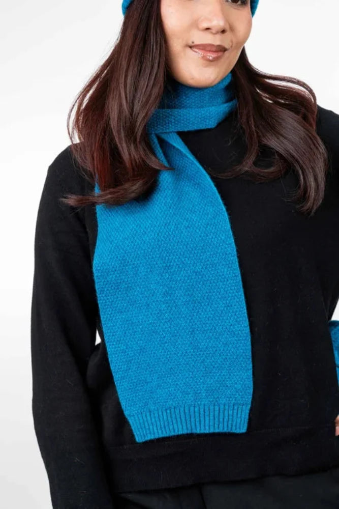 Possum and Merino  TR100 Moss Stitch Scarf - A plain scarf using moss stitch.  Makes a set with TR49 Plain Gloves and TR200 Moss Stitch Beanie.   One Size Only – Approx. 19cm wide x 157cm long   Made proudly in New Zealand from a luxurious blend of 25% possum fur, 65% merino & 10% silk.