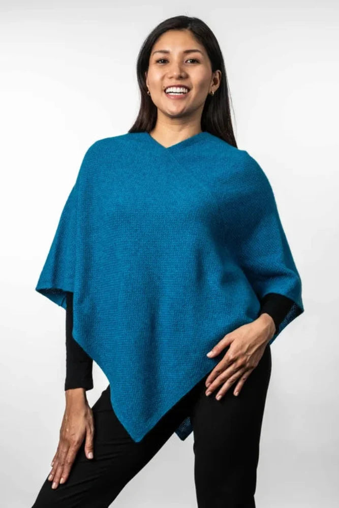 Possum and Merino  TR1022 Moss Stitch Poncho - This moss stitch poncho can be worn two different ways, with the hem straight across or on a diagonal.  One size only