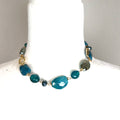 Turquoise crystal beaded short necklace with faceted blue-green beads, crystal accents, a silver-tone chain, and lobster clasp closure.