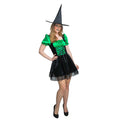 Woman wearing a green and black sexy witch costume with a pointed hat on a white background